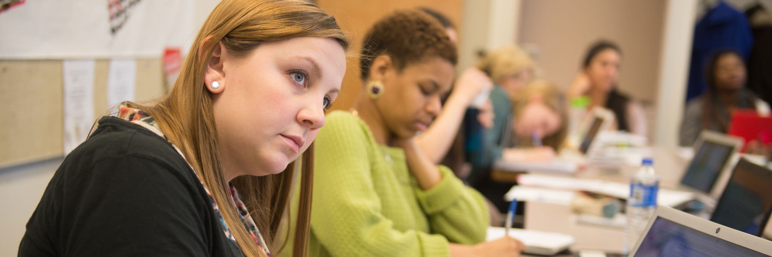 Students listen to a lecture.